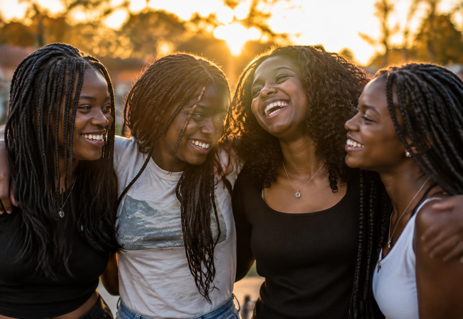 Young Black girls laughing together